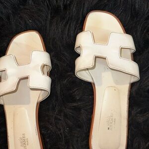 Hermes slides worn as is. Recently bought new ones wanted to sell these.